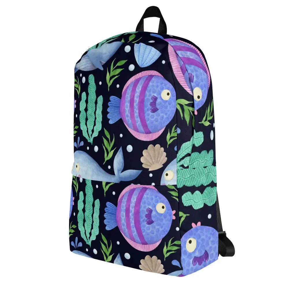 Featuring playful ocean designs, this backpack brings a splash of coastal fun to everyday adventures. SHOP Now at The Wishful Fish 