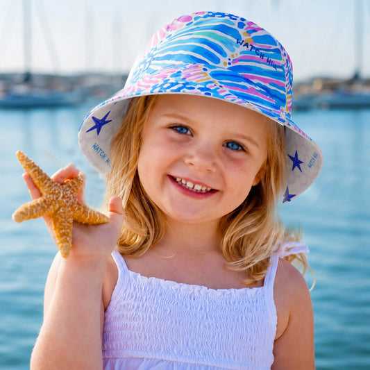 Two Sides, Double the Fun. Reversible Bucket Hat.  SHOP Now at The Wishful Fish