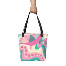 Load image into Gallery viewer, Pink and Green Twist Tote Bag | Front View Holding Tote | The Wishful Fish Shop

