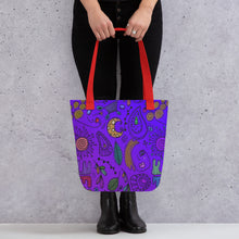Load image into Gallery viewer, Purple Passion Tote Bag | 15&quot; x 15&quot; | Front View Lifestyle Photo | Red Handles | The Wishful Fish
