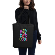 Load image into Gallery viewer, &quot;Beyond Cool&quot; Eco Organic Cotton 3/1 Twill Tote Bag | Black | Front View Lifestyle Photo | Shop The Wishful Fish
