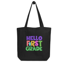 Load image into Gallery viewer, HELLO FIRST GRADE Eco Tote Bag for Teachers | Black | 16&quot; x 14.5&quot; | Front View | Shop The Wishful Fish
