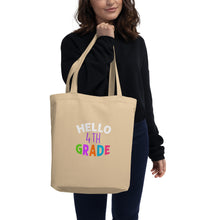 Load image into Gallery viewer, HELLO FOURTH GRADE Eco Tote Bag For Teachers | Front View Lifestyle Photo | Oyster | Shop The Wishful Fish
