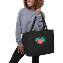 Load image into Gallery viewer, Zodiac Aries Large Organic Cotton Tote Bag | Front &amp; Back View Lifestyle Photo | The Wishful Fish
