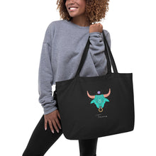 Load image into Gallery viewer, Zodiac Taurus Large Organic Cotton Tote Bag | Front and Back View Lifestyle Photo | The Wishful Fish
