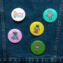 Load image into Gallery viewer, Space Robots Set of 5 Pin Buttons | Front View | Lifestyle Photo | SET 1 | 2.25&quot; x 2.25&quot; | The Wishful Fish
