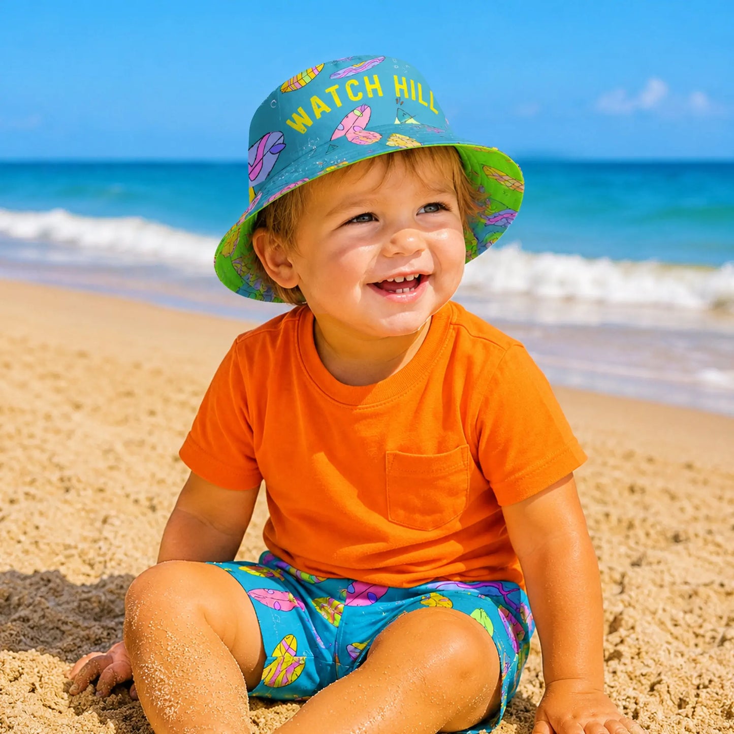 The Kids Bucket Hat is designed for sunny days by the shore in Watch Hill RI. SHOP Now at The Wishful Fish